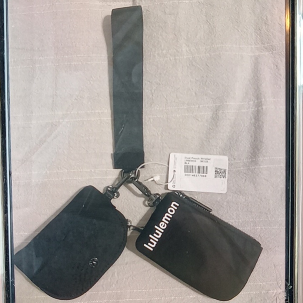 Lulu lemon Dual pouch keychain wrestle it.
